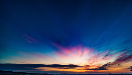 Wall Mural - panoramic sunrise over a green field