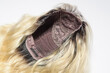 close up of wavy black to blonde two tone ombre style human hair lace wigs 