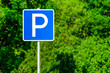 Parking sign on natural green background