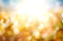 A Golden Sunny Autumn Thanksgiving Sunset Sky With A Blurred Field Bokeh Background.