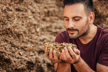 Wall Mural - Adult man, enjoying the life on the farm.