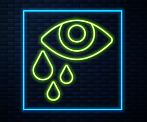 Sticker - Glowing neon line Tear cry eye icon isolated on brick wall background. Vector