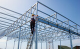 Fototapeta Miasta - Iron Worker on Constructions Site Reconstruction