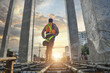 © Cavan Images - Construction worker wearing safety work on construction site