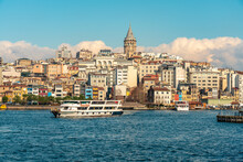 Turkey, Istanbul, Tourboat In Golden Horn Waterway And Karakoy Neighborhood