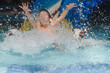 © Serhii - The boy is rolling with a water slide at a water park in Little Rock