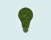 Green Light Bulb Environment Day And Earth Day 3d Concept Background. Sustainable Development, Ecology And Environment Protection Concept Bulb With Solar Energy , Renewable Energy, Nature Conservation