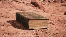 Old Book In Red Rock Desert