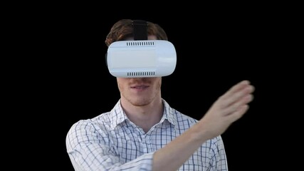 Poster - Animation of man wearing vr headset using virtual interface and smiling, on black background