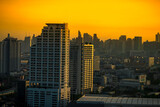 Fototapeta Miasto - panoramic high-angle evening background of the city view,with natural beauty and blurred sunsets in the evening and the wind blowing all the time,showing the distribution of city center accommodation