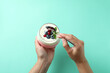 © Atlas - Concept of tasty breakfast with yogurt on mint background