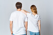 © SHOTPRIME STUDIO - man and woman hugging in white t-shirts mockup back view