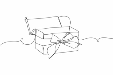 Wall Mural - Continuous one line of present gift box with ribbon bow christmas style in silhouette on a white background. Linear stylized.Minimalist.
