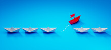 Row Of Paper Boats With Red Leader On Blue Background	
