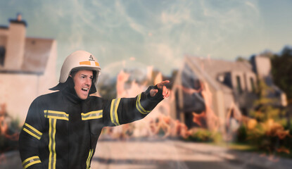 Wall Mural - Firefighter in uniform with helmet hurrying to rescue