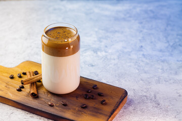 Wall Mural - Dalgona coffee. Iced fluffy creamy whipped trend drink with coffee foam and milk. trendy summer cold drink