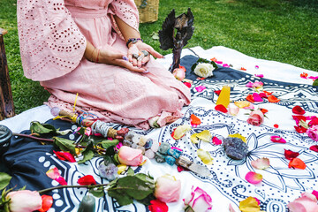 Mexican woman hands holding healing crystals for holistic therapy in Latin America