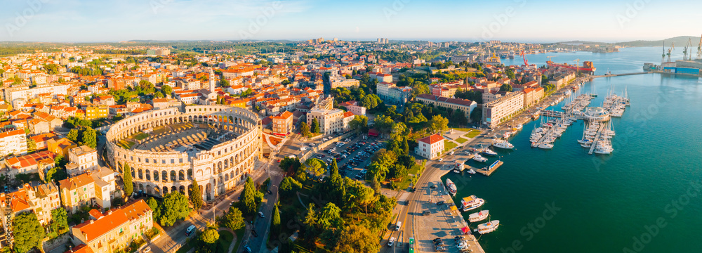 Aerial drone photo of famous european city of Pula and arena of roman time. - obrazy, fototapety, plakaty 