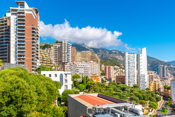 Wall Mural - View of the modern residential and commercial hillside district in the Mediterranean city of Monte Carlo, Monaco, on the French Riviera.
