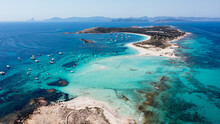 Aerial View Of The Beaches Of Ses Illetes On The Island Of Formentera In The Balearic Islands, Spain - Turquoise Waters On Both Sides Of A Sand Strip In The Mediterranean Sea