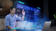 © Iokanan Pro - A man accesses his personal online banking platform on a futuristic holographic display using his fingers to touch a virtual display. Concept: Future and Technology