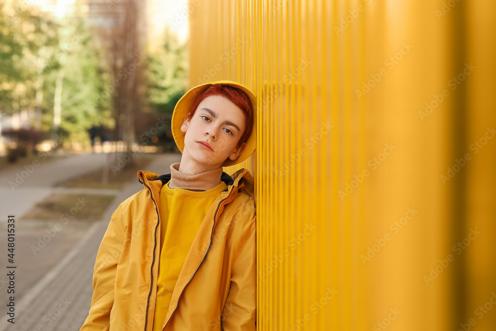 Portrait of non-binary teenager outdoors