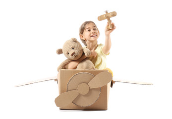 Poster - Little girl playing with toys on white background