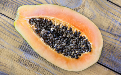 Canvas Print - Papaya on the wooden board