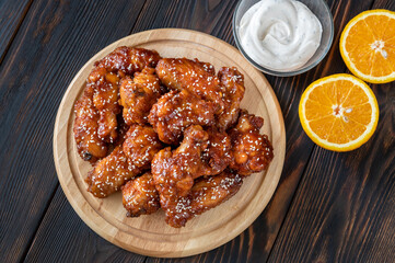 Wall Mural - Orange glazed chicken wings