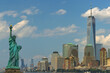 Panorama view of Statue of Liberty with Manhattan downtown skyscraper in lower Manhattan, New York City, USA