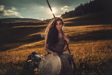 Beautiful Shamanic Girl Playing On Shaman Frame Drum In The Nature.