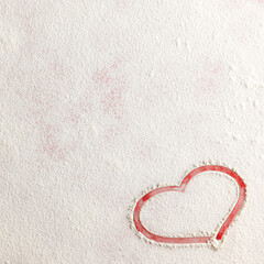 Wall Mural - Valentine love red heart shape made of flour on red background. Closeup.Christmas card.