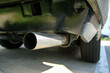 The detail of the exhaust tailpipe of the old classic veteran car. 