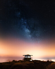 Lifesaver house under starry sky at night