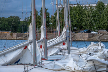 Training sailboats at the pier