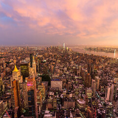 Fototapete - New York City skyline with Manhattan skyscrapers at dramatic stormy sunset, USA.