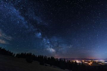 Wall Mural - bright starry sky with the milky way on the background of high tatras mountains