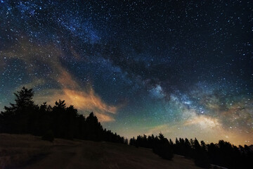Wall Mural - bright starry sky with the milky way on the background of high tatras mountains
