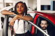 © prostooleh - Stylish black woman in a car salon