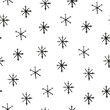 © Minur - Seamless pattern with hand drawn snowflakes.