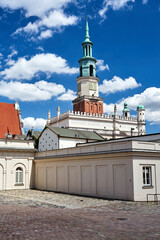 Canvas Print - Historic buildings and the tower of the Renaissance town hall on the market square