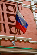 Russian Tricolor Flag On Classic Historical Building At Night