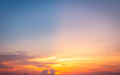 Wall Mural - beautiful vivid sky painted by the sun leaving bright golden shades.dense clouds in twilight sky in 
