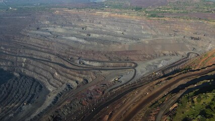 Wall Mural - huge iron ore quarry iron ore mining aerial video filming drone top view flight over