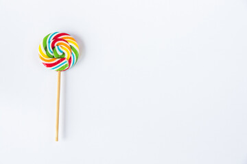 Canvas Print - Top view of a colorful sweet lollipop isolated on a white background