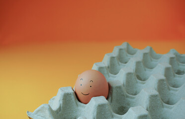 Eggs, in a paper panel, background, yellow, and orange, in concept, feeling warm, in love, eating eggs and being useful, free space.