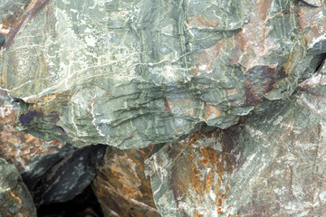 huge pile with boulders near the mountain