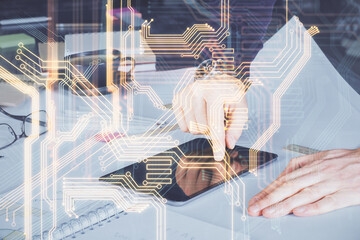 Fototapete - Double exposure of man's hands holding and using a digital device and tech theme hologram drawing. Technology concept.