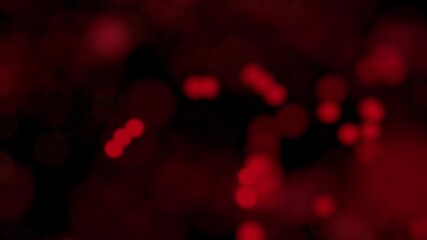 Poster - Abstract video background made of blurred flying or floating red circles.