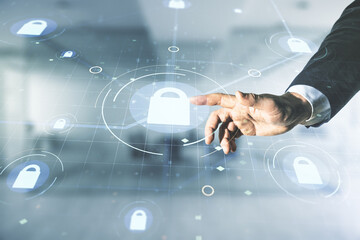 Poster - Developer's hand clicks on virtual creative lock illustration with microcircuit on blurred office background, cyber security concept. Multiexposure